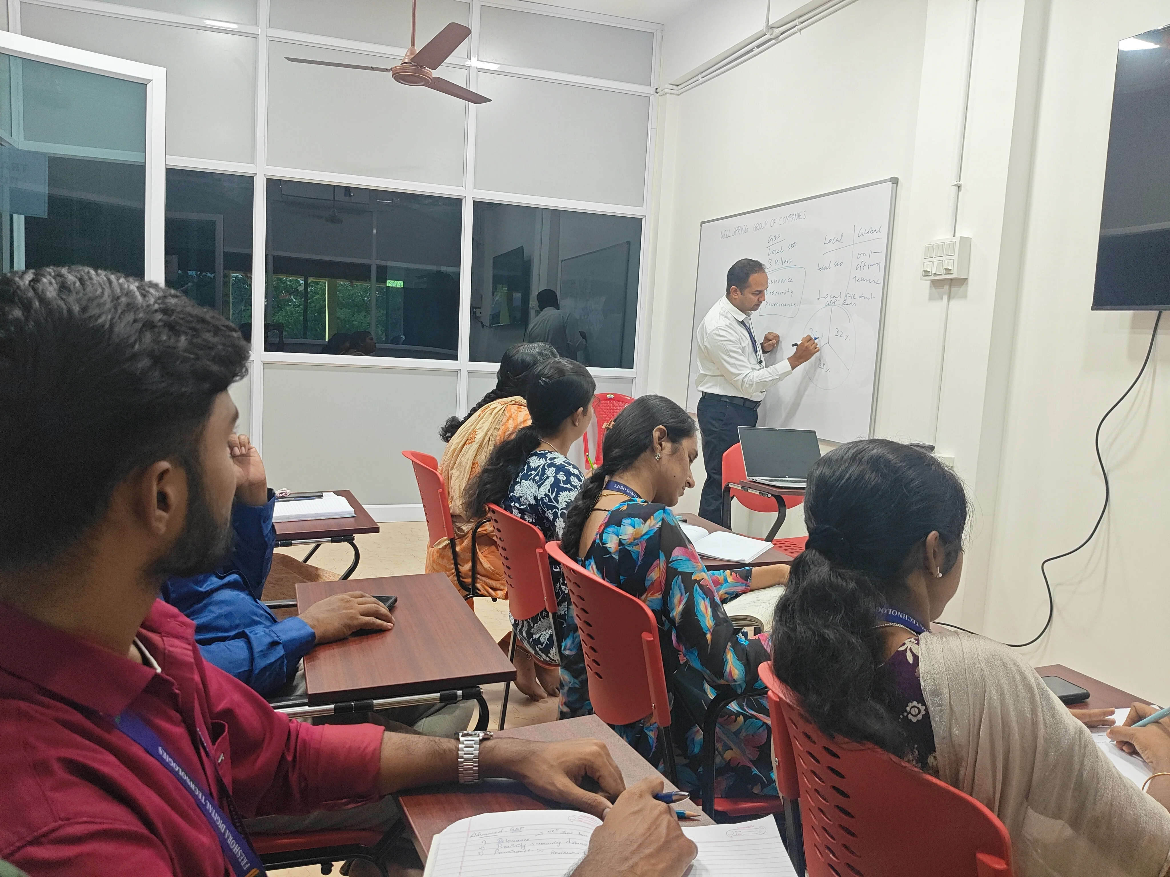 Freshora team members sharing a workplace moment together